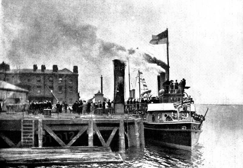 Lord Charles Beresford's party at Portsmouth: M.P.s...en route for Whale Island, 1898. Creator: Russell & Sons.