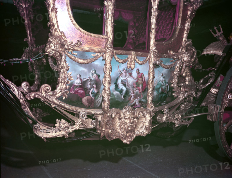 Detail of the Gold State Coach at the time of the coronation of Queen Elizabeth II, 1953. Creator: Arthur Charles Kirby Ware.