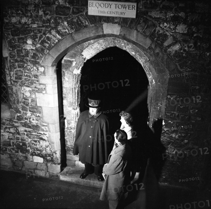 Yeoman Warder and visitors at the Bloody Tower, Tower of London, c1955. Creator: Arthur Charles Kirby Ware.