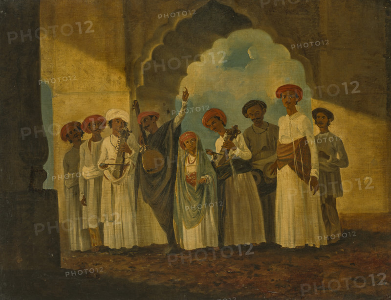 A group of musicians playing Sarangi, a Tambura and Tablas. Creator: Hodges, William (1744-1797).