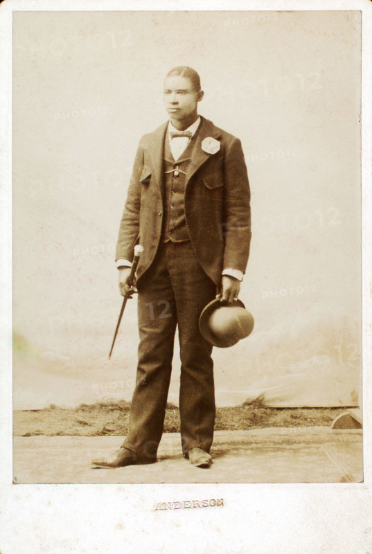 Full length portrait of man with bowler hat and cane, c1890-c1899. Creator: Anderson.