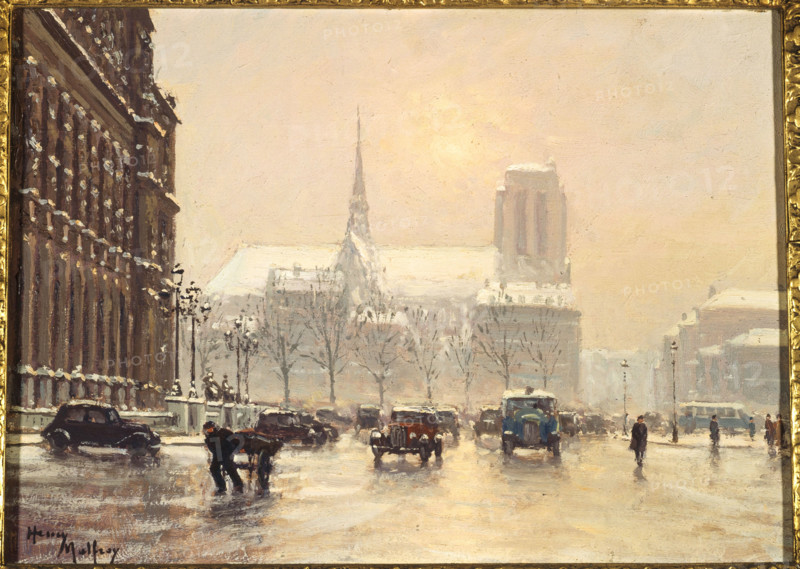 Notre-Dame seen from the square at Hotel de Ville, in snowy weather, c1930. Creator: Henry Malfroy.