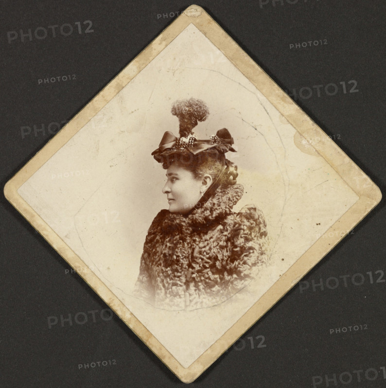 Portrait of a woman, 1889-1910. Creator: George M Dempsie.
