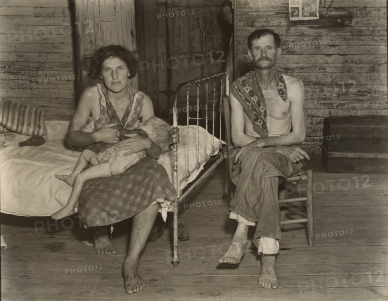 Bud Fields with His Wife Ivy, and His Daughter Ellen, Hale County, Alabama, 1936. Creator: Walker Evans.
