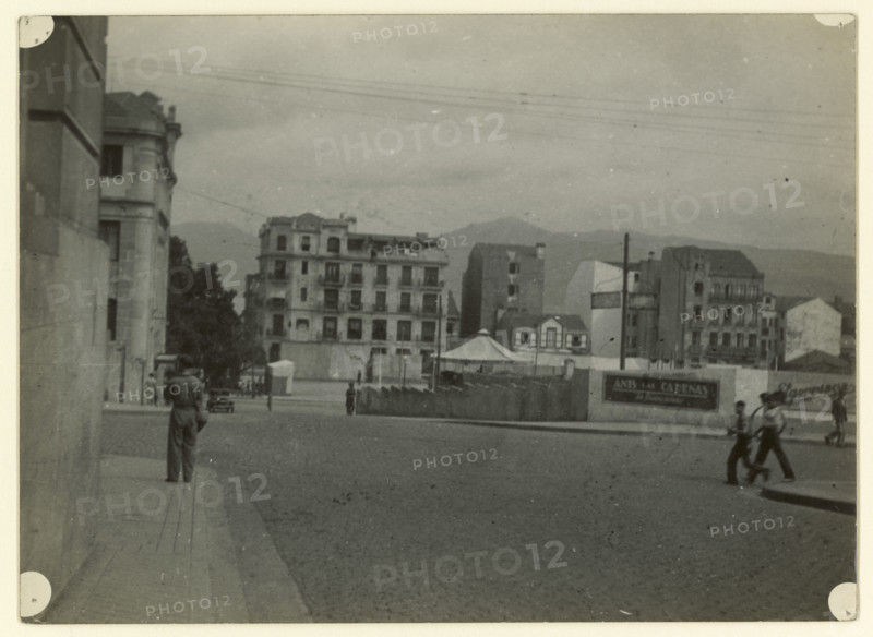 Street scene, Spain, early-mid 20th century. Creator: Edward Morland Lewis.