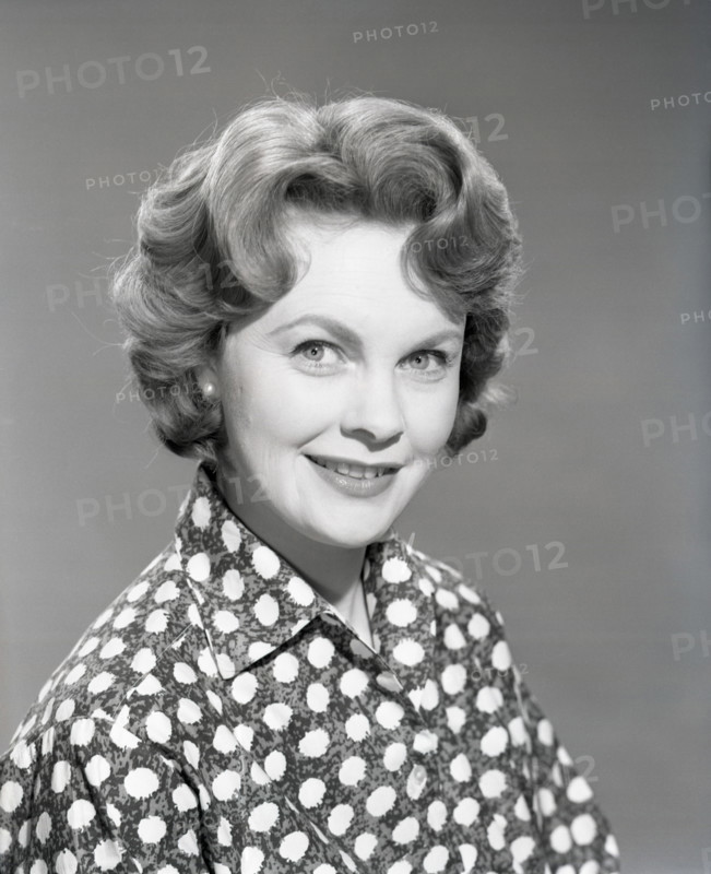 Woman in patterned blouse, c1955. Creator: Arthur Charles Kirby Ware.
