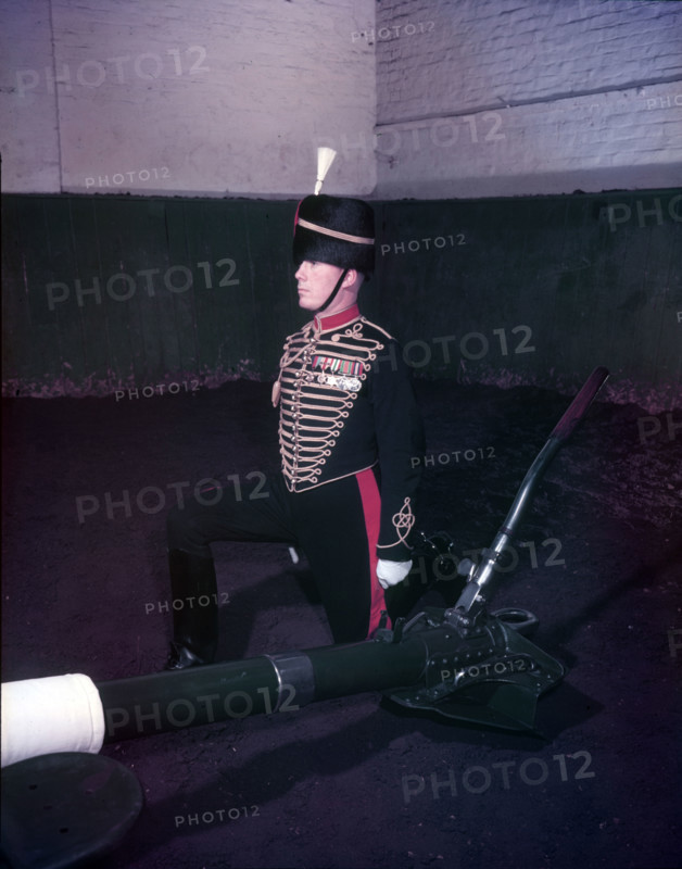 Royal Horse Artillery gun team in full dress, sergeant kneeling, c1953.  Creator: Arthur Charles Kirby Ware.