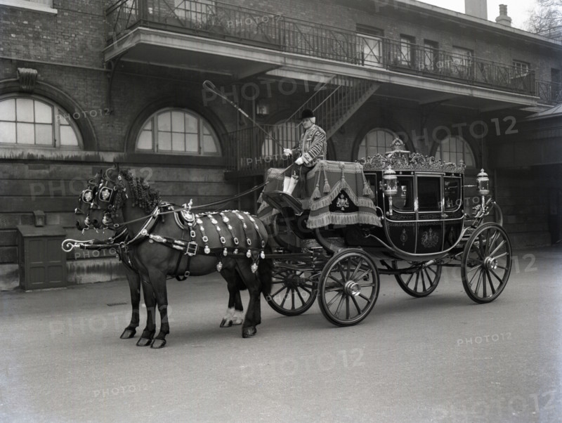 The Irish State Coach, Royal Mews London, 1953.  Creator: Arthur Charles Kirby Ware.