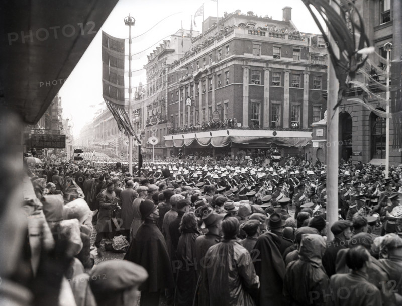 Crowds watching the coronation procession of Queen Elizabeth II, Oxford Street, London, 2 June 1953. Creator: Arthur Charles Kirby Ware.