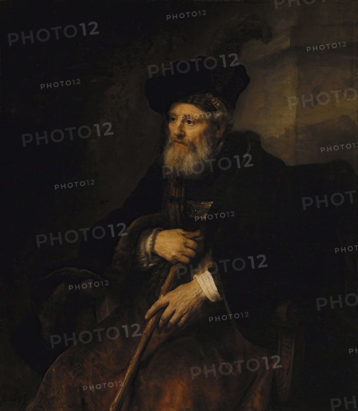 Seated old man with a cane in fanciful costume, 1645. Creator: Rembrandt Harmensz van Rijn.