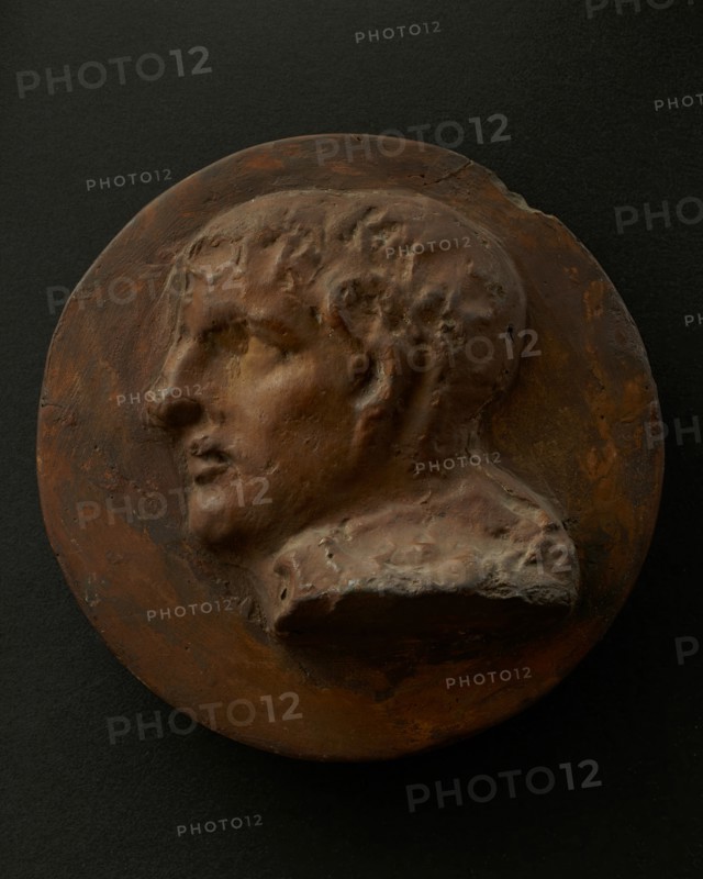 Cast of head of young, clean-shaven Roman. Creator: Unknown.