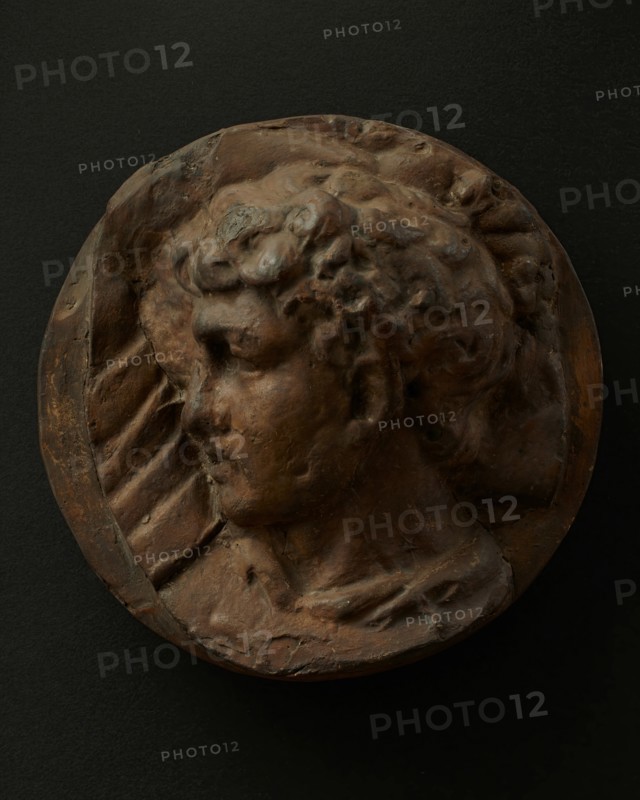 Cast of left profile of legionary with hammer in hand. Creator: Unknown.
