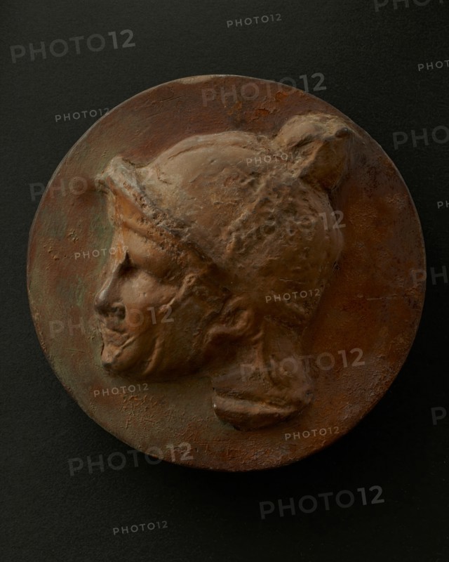 Cast of head of young Roman auxiliary wearing helmet. Creator: Unknown.