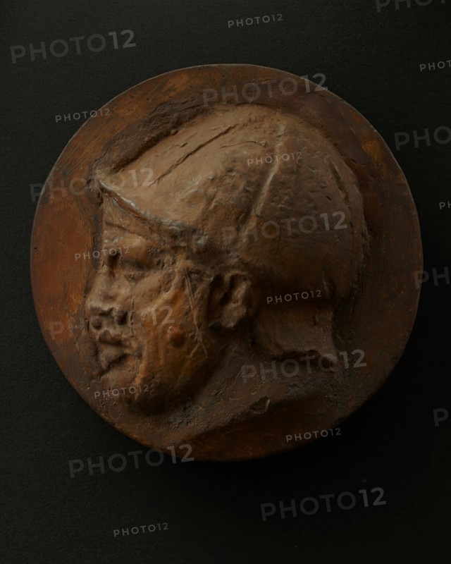 Cast of head of deceased or sleeping Roman auxiliary in helmet. Creator: Unknown.
