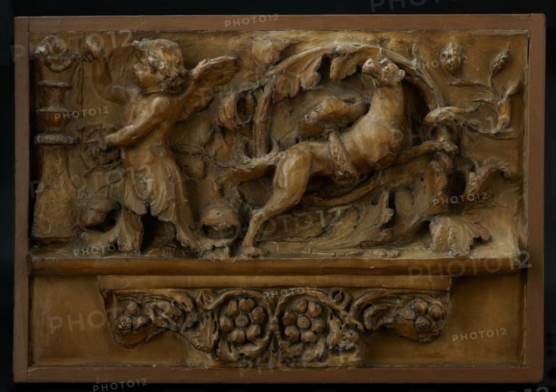Cast of lost frieze (?) from Aula Regia mounted over cast of scrolls and flowers. Creator: Unknown.