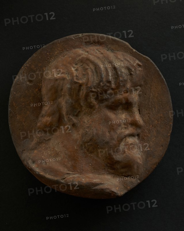 Cast of head of bearded Dacian in cloak. Creator: Unknown.