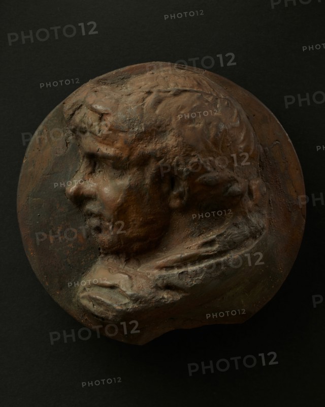Cast of head of Roman man wearing wreath. Creator: Unknown.