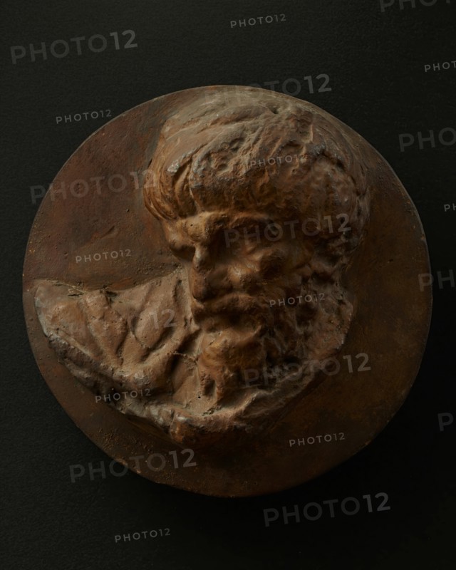 Cast of the head of a Dacian man looking down and to his right. Creator: Unknown.