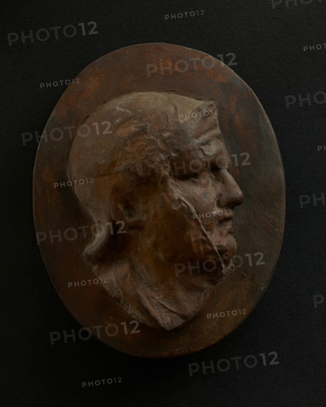 Cast of head of Roman soldier in helmet with bulging brow. Creator: Unknown.