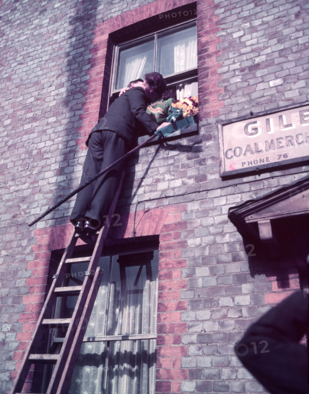 Tutti Man claiming a kiss, Hocktide Festival, Hungerford, Berkshire, c1955. Creator: Arthur Charles Kirby Ware.