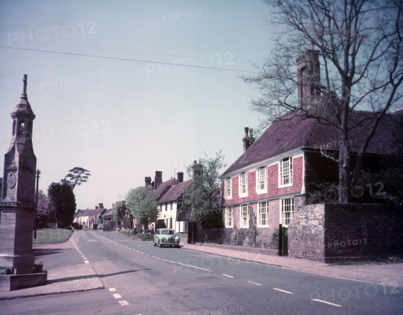 High Street and war memorial, Burwash, Sussex, c1955. Creator: Arthur Charles Kirby Ware.