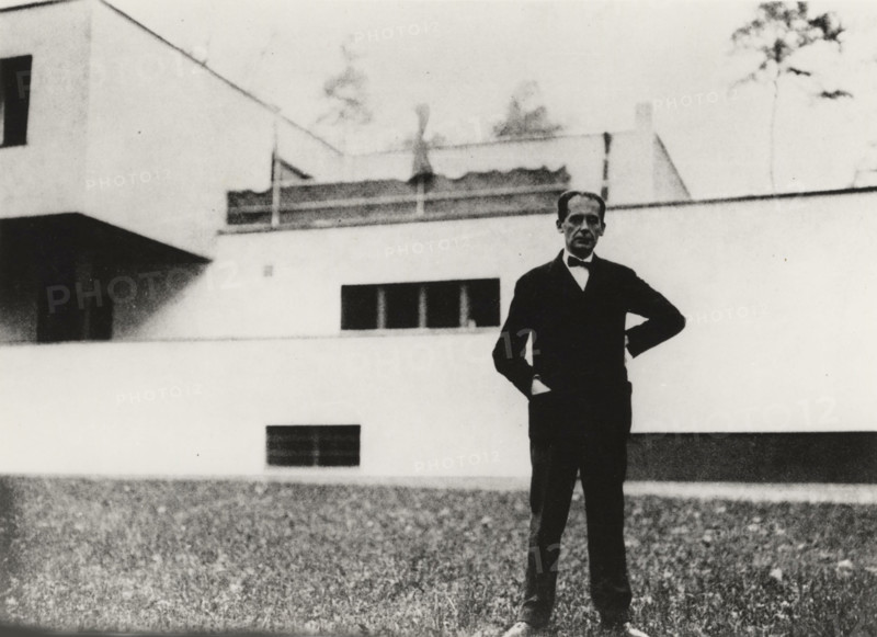 Walter Gropius in front of his home in Dessau, 1926-1927. Creator: Anon.