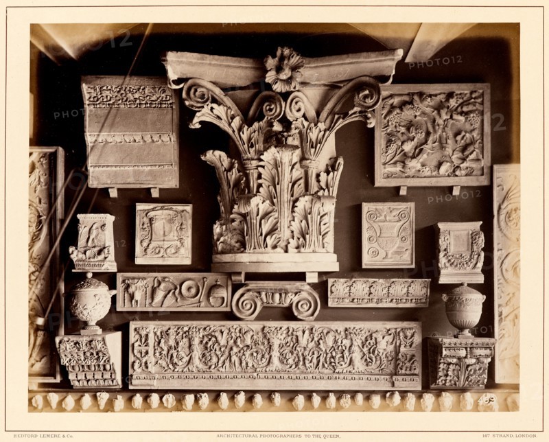 Casts of Roman capital, possibly from Pantheon, late Roman frieze and other fragments, 1876. Creator: Bedford Lemere and Company.