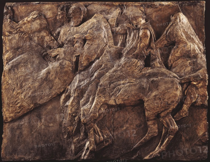 Cast of slab of riders from North frieze of Parthenon (figures 125-127, Slab XLV=Michaelis XL). Creator: Unknown.