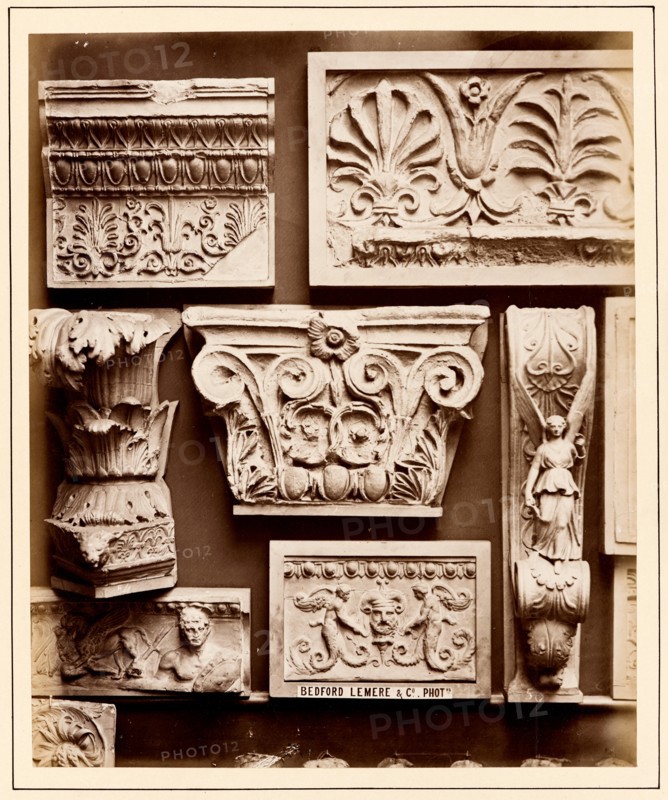 Casts of frieze from Erechtheum, Roman honeysuckle, Greek pilaster capital, corbel with..., 1876. Creator: Bedford Lemere and Company.