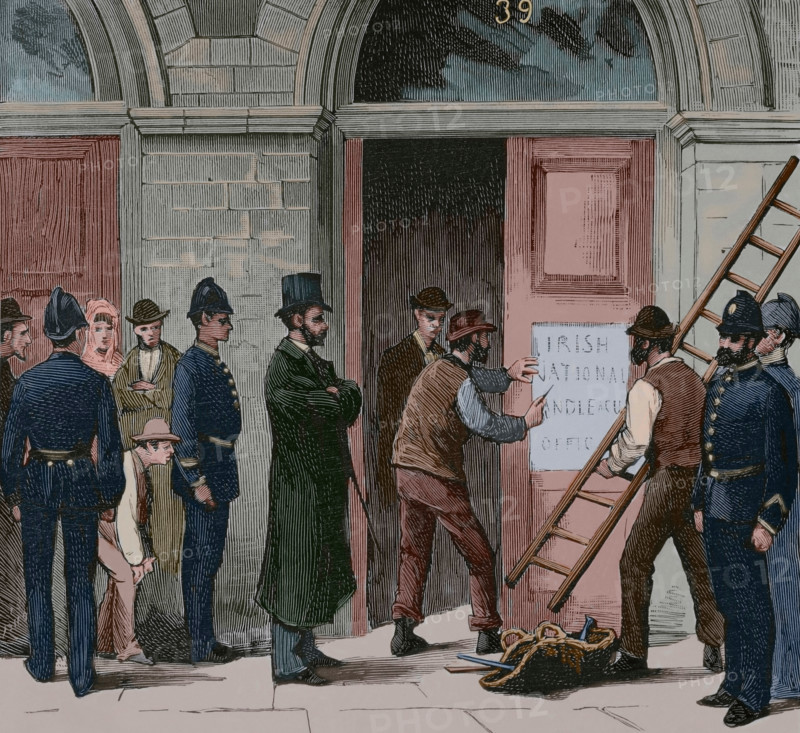 Law enforcement officers removing the inscription from the door of the Irish National Land...1881.  Creator: Unknown.