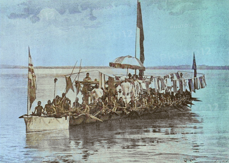 King Koko Mingi VIII war canoe on the Brass River, c1880s. Creator: Andre & Sleigh.