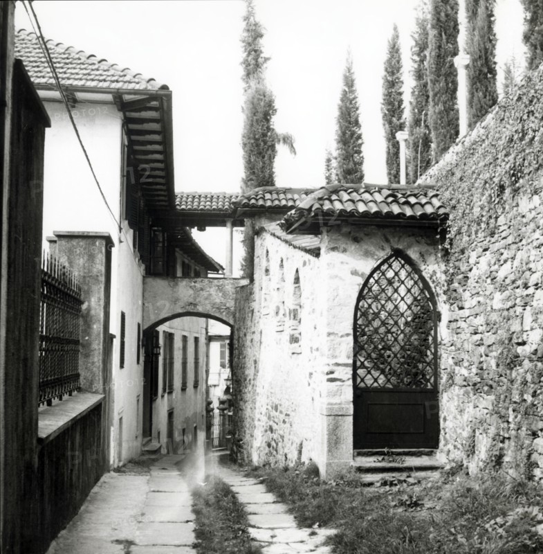 Narrow street, island of San Giulio, Lake Orta, Italy, c1955.  Creator: Arthur Charles Kirby Ware.