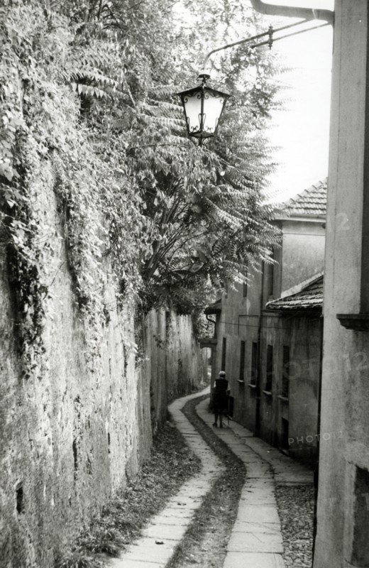 Narrow street, Orta San Giulio, Lake Orta, Italy, c1955.  Creator: Arthur Charles Kirby Ware.