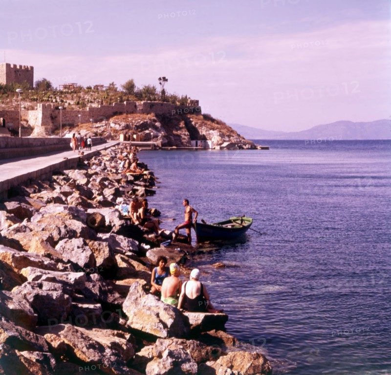 Bathing from the causeway, Kusadasi, Turkey, c1955. Creator: Arthur Charles Kirby Ware.