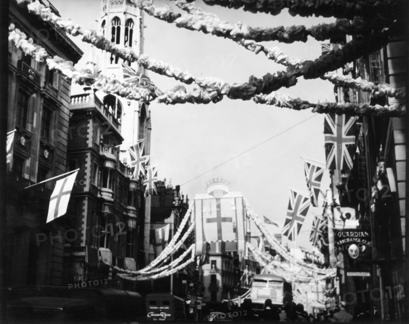 Union flags and decorations, coronation of Queen Elizabeth II, Fleet Street, London, June 1953.  Creator: Arthur Charles Kirby Ware.