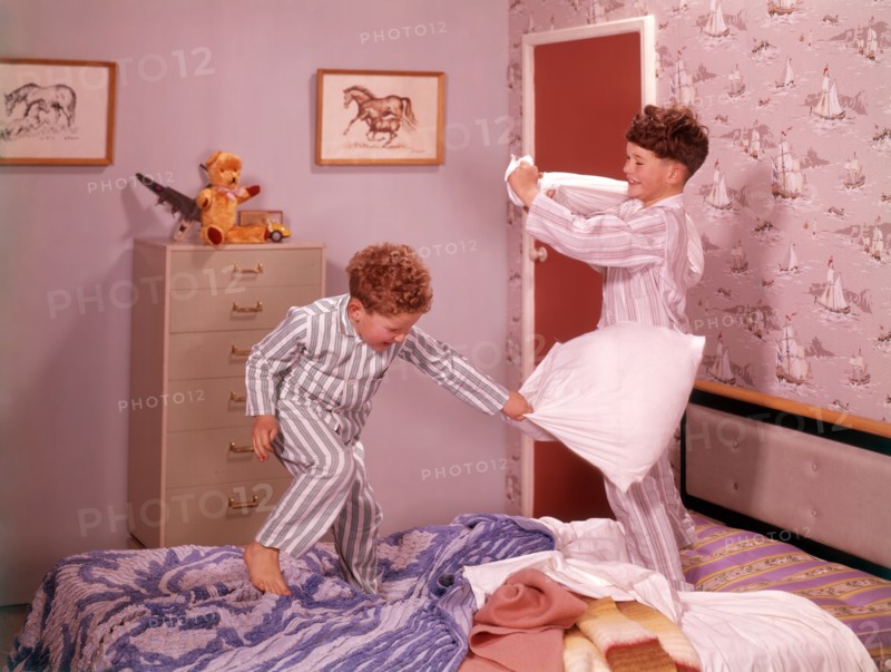 Two boys having a pillow fight, c1955.  Creator: Arthur Charles Kirby Ware.