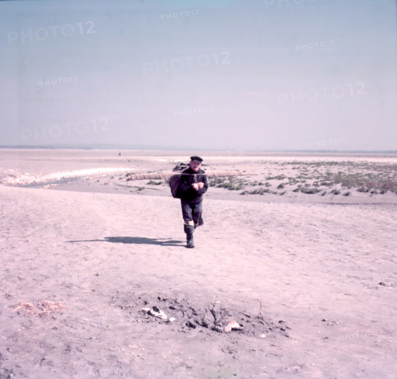 Shrimper on sands, Mont-Saint-Michel, Brittany, France, c1955. Creator: Arthur Charles Kirby Ware.
