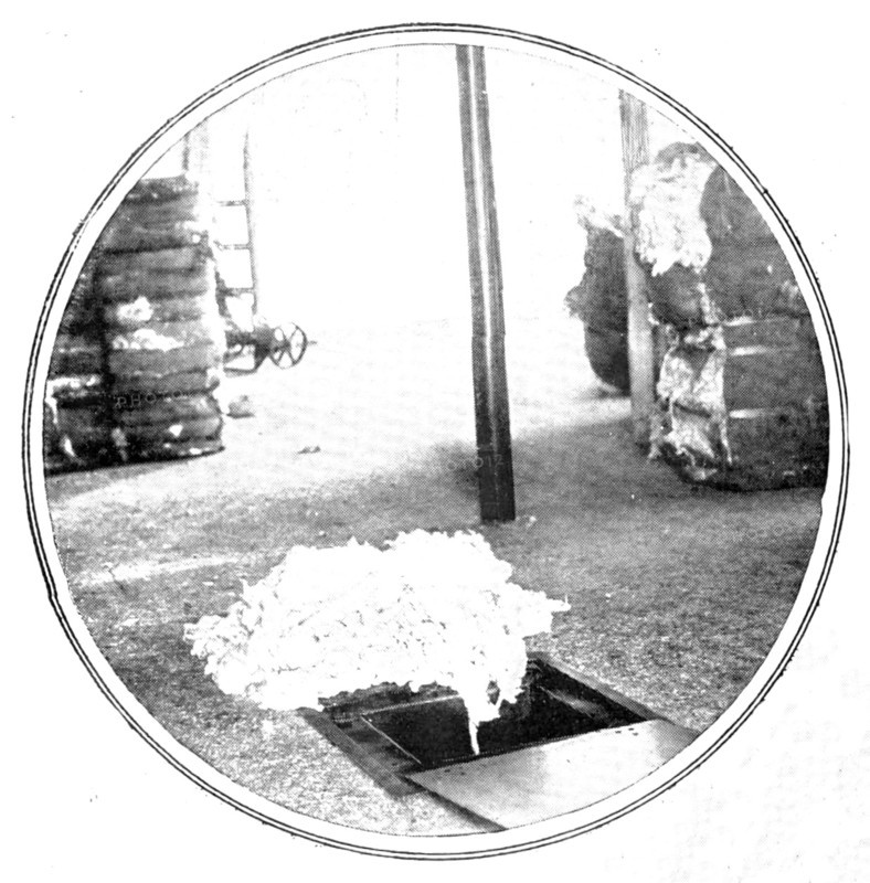 Bales of compressed cotton as received in Manchester..., 1909.  Creator: Unknown.