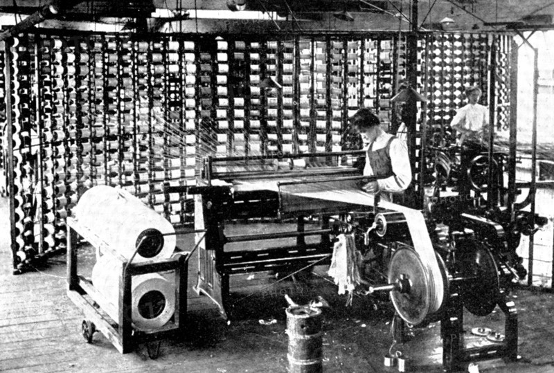 Fabric in the making: warping, 1909. Creator: Unknown.