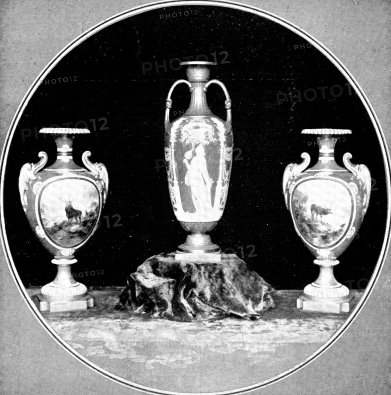 Beautiful examples of the potter's craft: a fine pair of Worcester vases and a..."Solon" vase, 1909. Creator: Unknown.