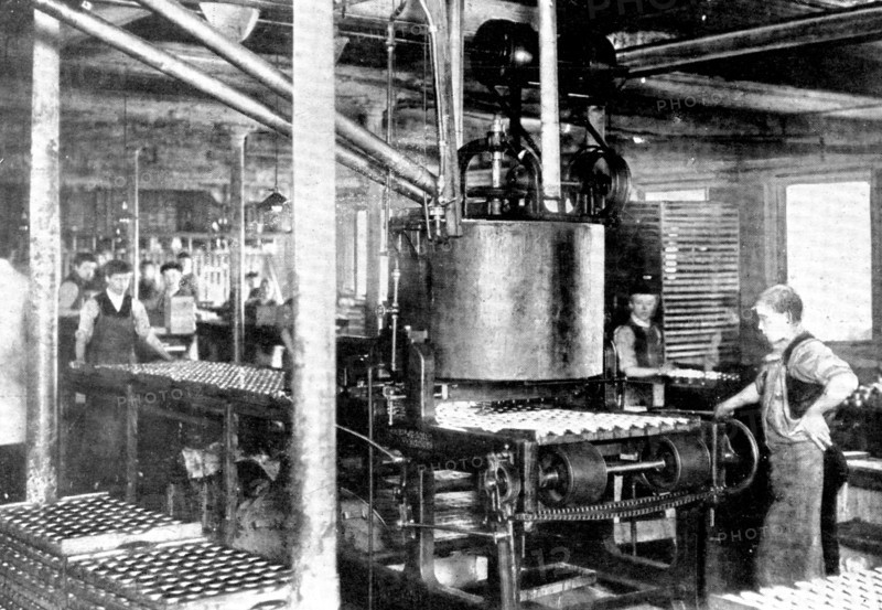 Fourteen thousand tins an hour! A machine that fills tins of "shoeshine", 1909. Creator: Unknown.