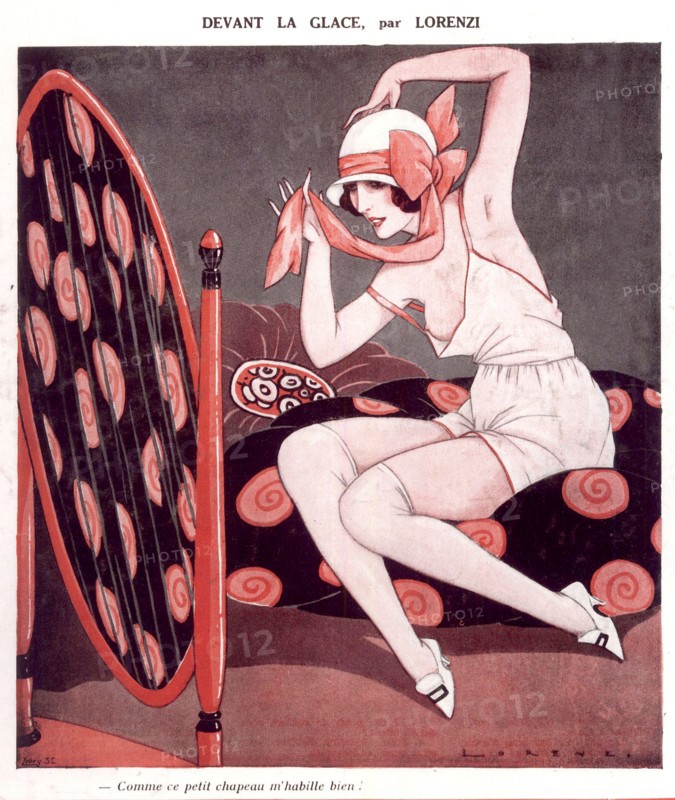 Les années folles, femmes, Mode, sous vêtements. Une jeune femme à demi nue, ajuste son chapeau devant son miroir.