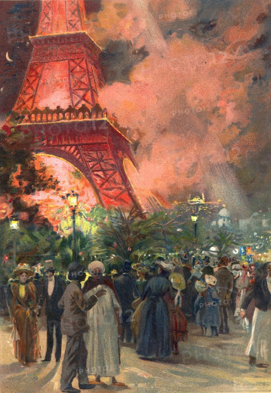 Pendant l'Exposition Universelle de 1889 à Paris, embrasement de feux de Bengale rouges sur la Tour Eiffel.