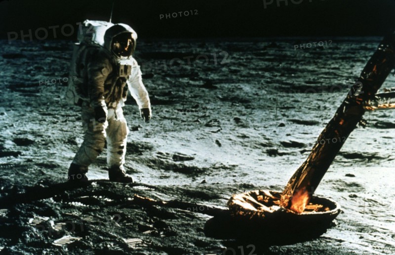 The Apollo 11 MNO 16 crew inspecting the LEM's foot pad