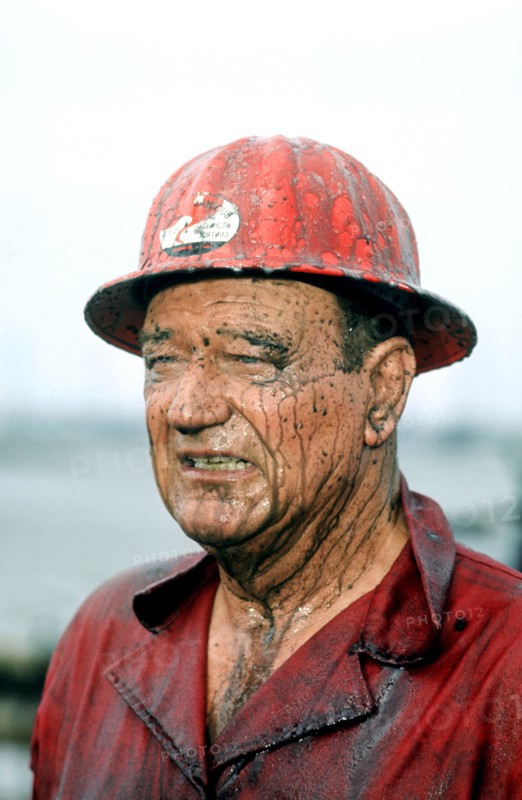John WAYNE, portrait with hard hat in 'The Undaunted', 1968