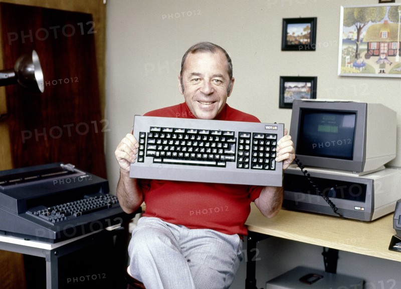 Chris HOWLAND with computer keyboard, undated