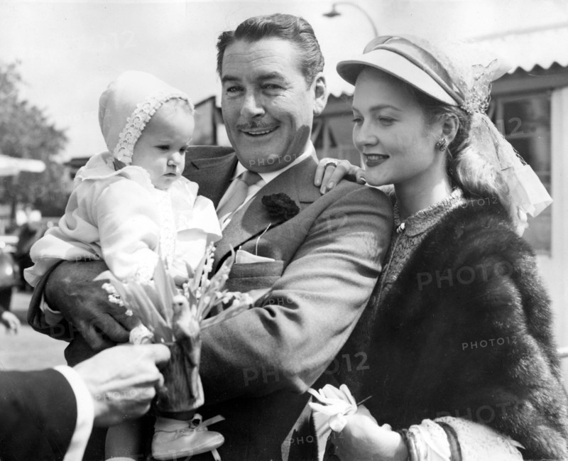 Errol FLYNN with wife Patrice WYMORE and daughter Armelia, 1954