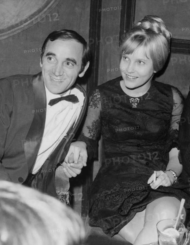 Charles AZNAVOUR with his wife in a Paris nightclub, 1965