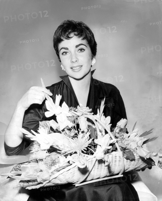 Elizabeth TAYLOR with basket of flowers