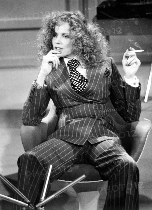 VERUSCHKA in a pinstripe suit